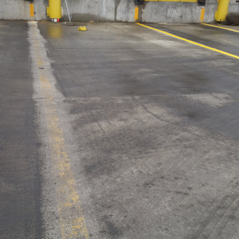 Parking spaces with yellow pavement markings