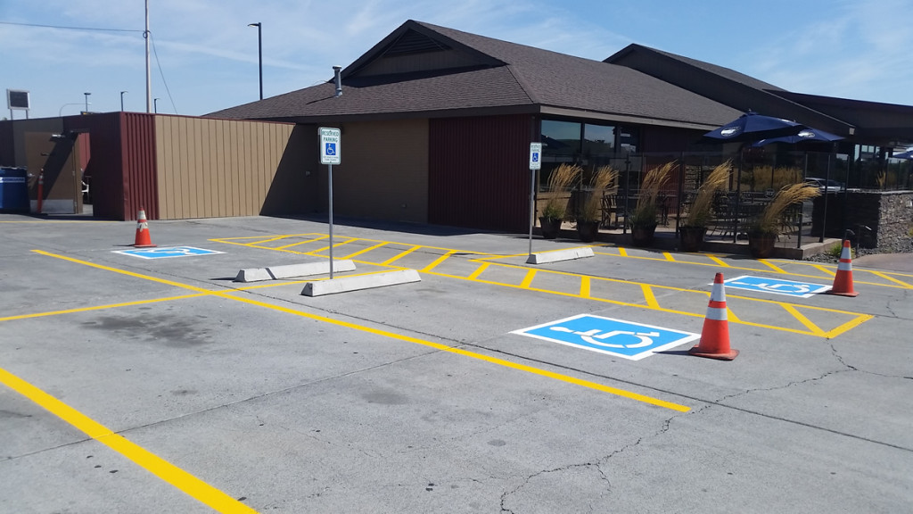 A parking lot with no cars in it.