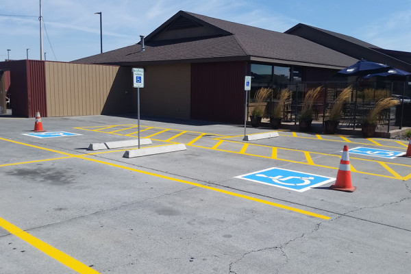 A parking lot with no cars in it.