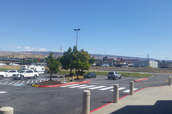 A parking lot with cars parked in it.