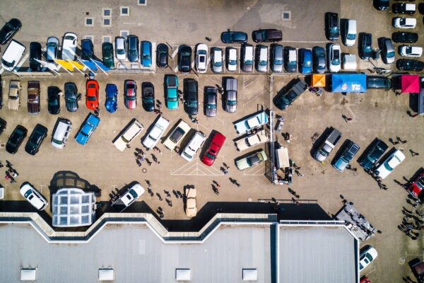 Aerial view of crowded parking lot.